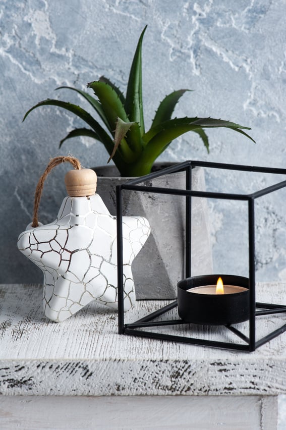 Scandinavian Interior with Lit Candle and Succulent