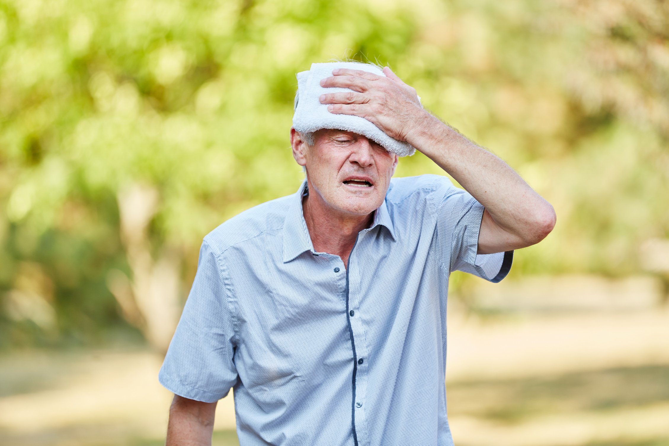 Senior Man Cools His Head  