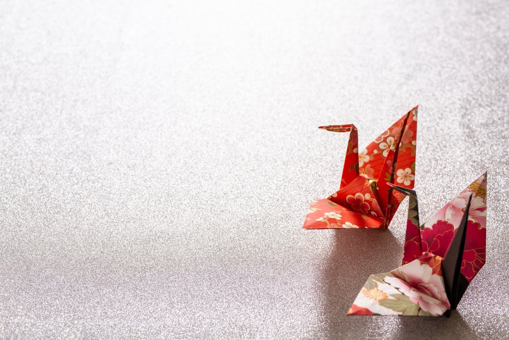 Origami crane, Japanese style background.